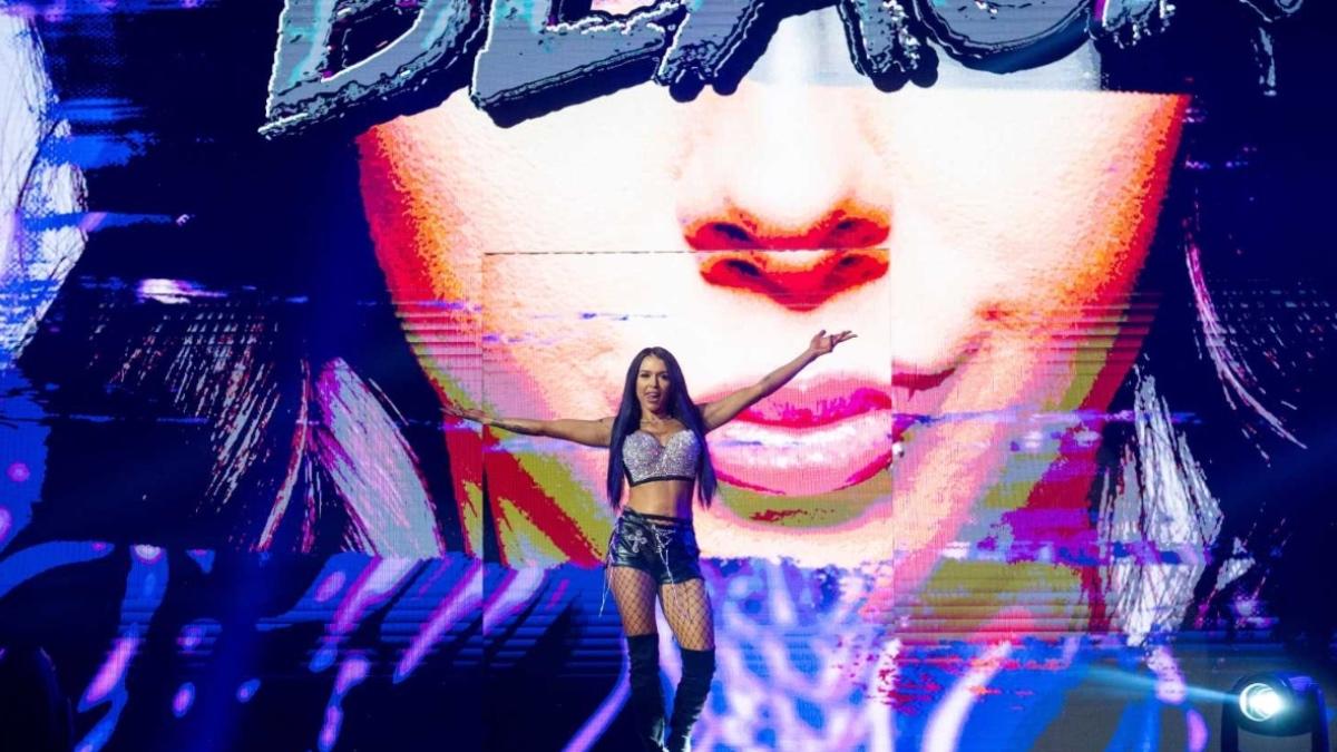 Elayna Black with her arms outstretched on the entrance ramp during IMPACT premiere on AMC