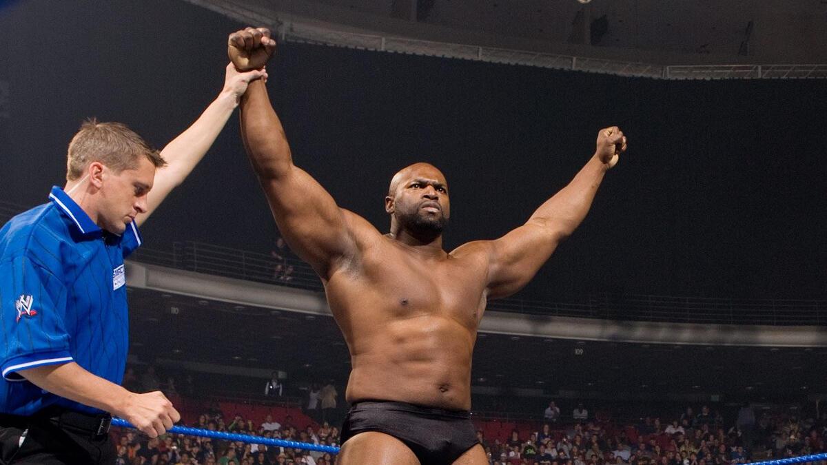 Ezekiel Jackson has his hand raised by the referee following a match on SmackDown in 2008