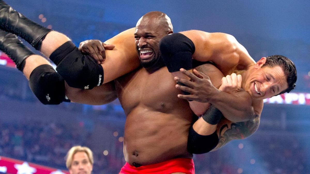 Former WWE star Ezekiel Jackson lifts up Wade Barrett during their match at the 2011 Capitol Punishment pay-per-view.