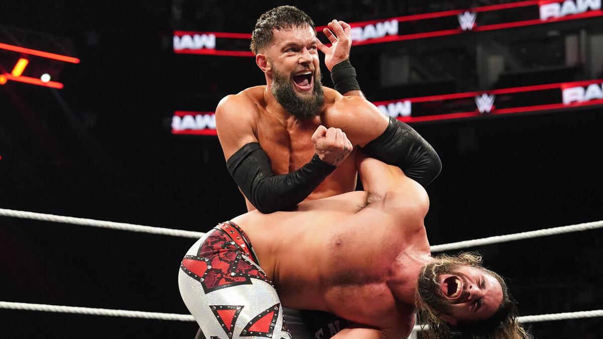 Finn Balor with abdominal stretch on WWE Raw 