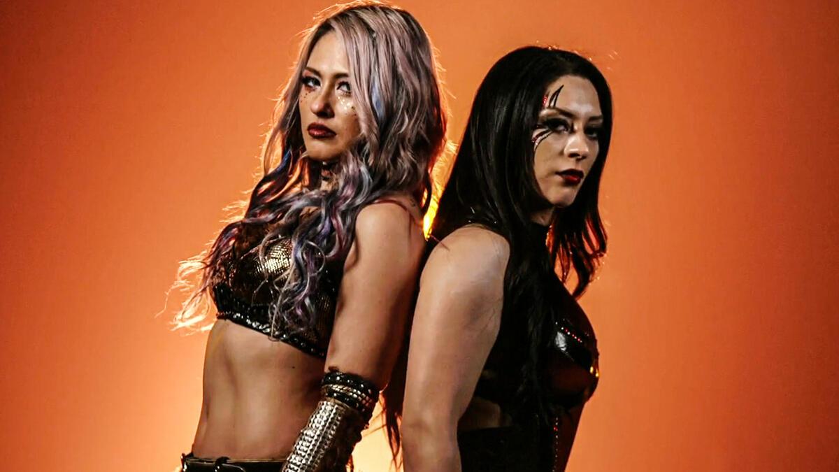 WWE NXT stars Giulia and Stephanie Vaquer stand side by side during a promotional video package