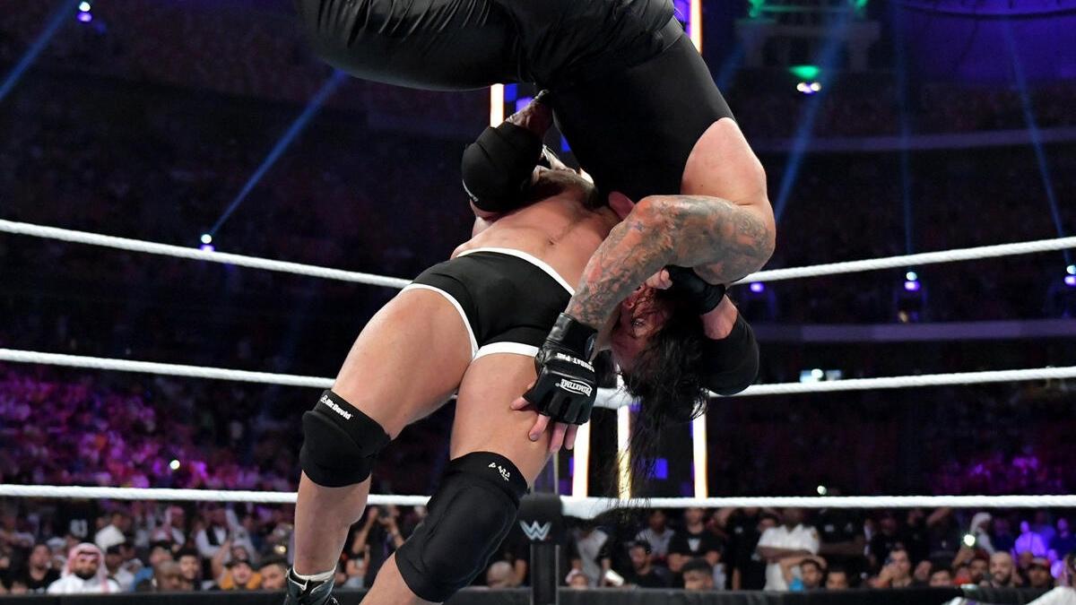 Goldberg hitting a botched Jackhammer on The Undertaker at WWE Super ShowDown 2019