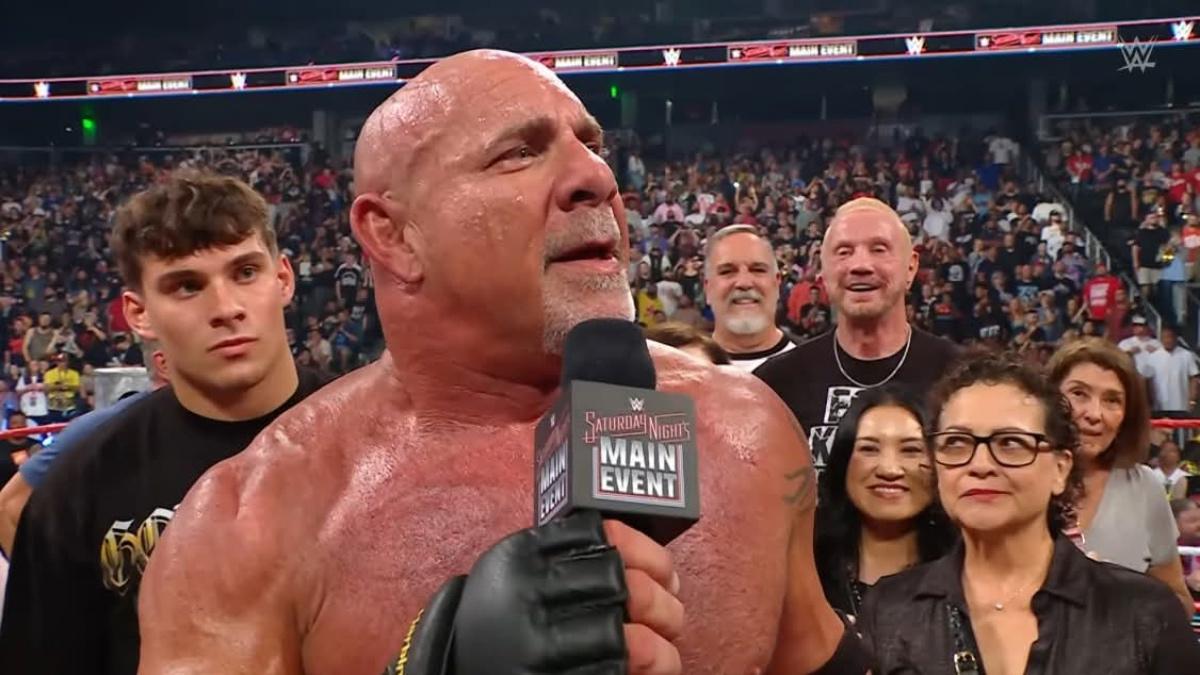 Goldberg holding the microphone at WWE Saturday Night's Main Event