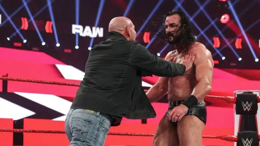 Goldberg pushes Drew McIntyre.jpg