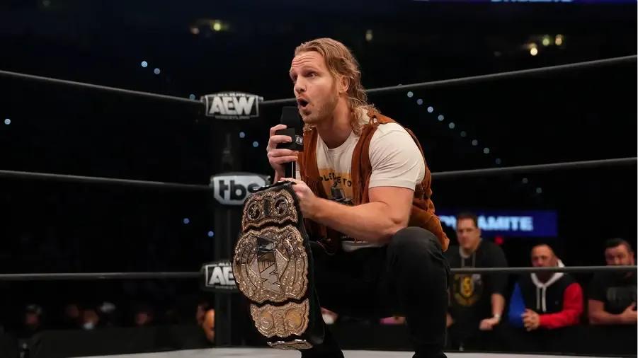 Hangman Page AEW World Title brown vest.jpg