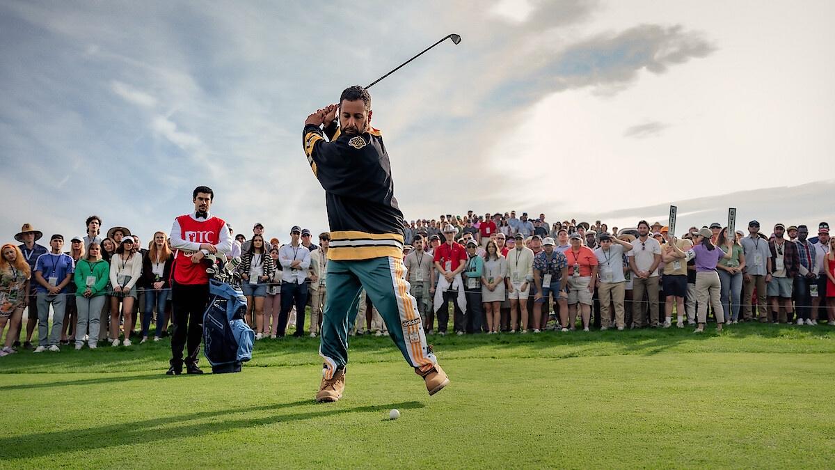 Adam Sandler as Happy Gilmore swinging a golf club