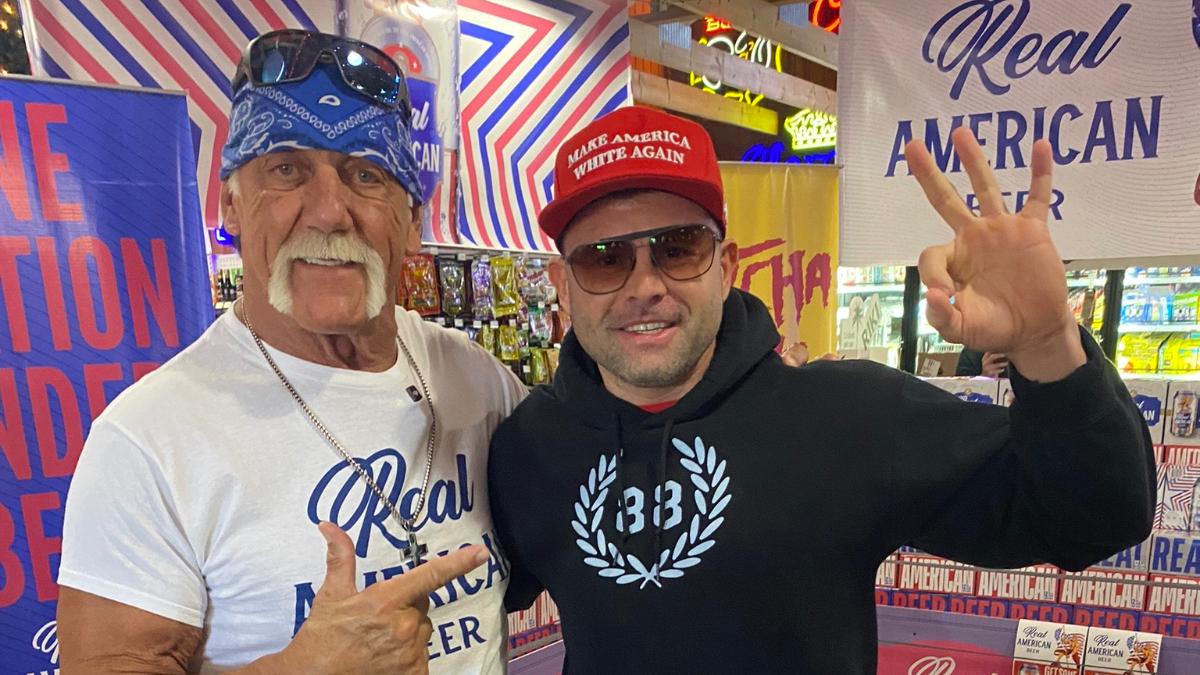 Hulk Hogan stood with convicted criminal Anthony Hammer who is wearing an '88' hoodie and a 'Make America White Again' hat