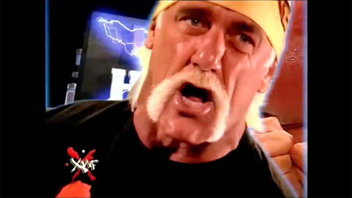 Hulk Hogan cutting a promo on XWF episode one with his blonde fumanchu and yellow bandana