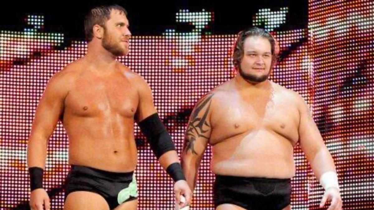 Husky Harris walking to the ring with Curtis Axel on WWE TV