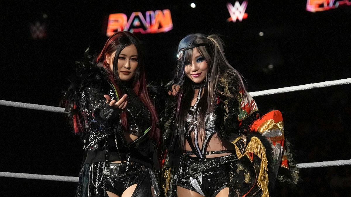 WWE stars IYO SKY and Kairi Sane pose for a photograph prior to a match on Raw