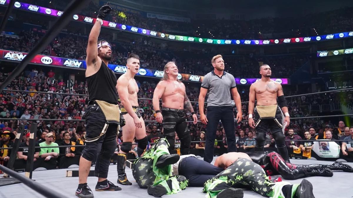 The Inner Circle standing over the Young Bucks at AEW Dynamite debut episode