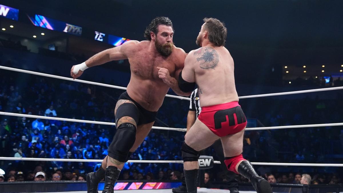 Jake Doyle hitting Cash Wheeler with a shoulder charge