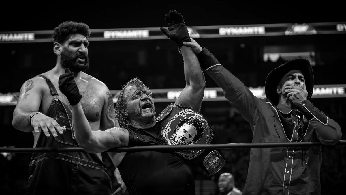 Jeff Jarrett holding the Texas Chain Saw Massacre Death Match Title