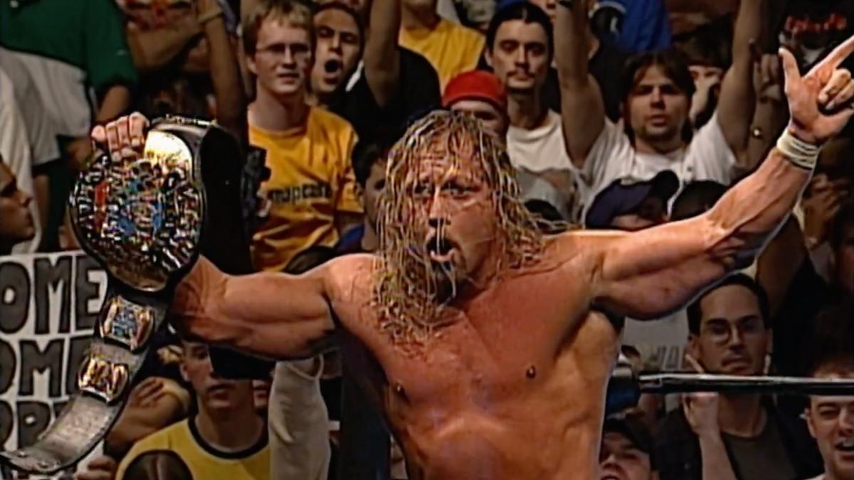 Jerry Lynn celebrating with the ECW World Heavyweight Title at Anarchy Rulz 2000