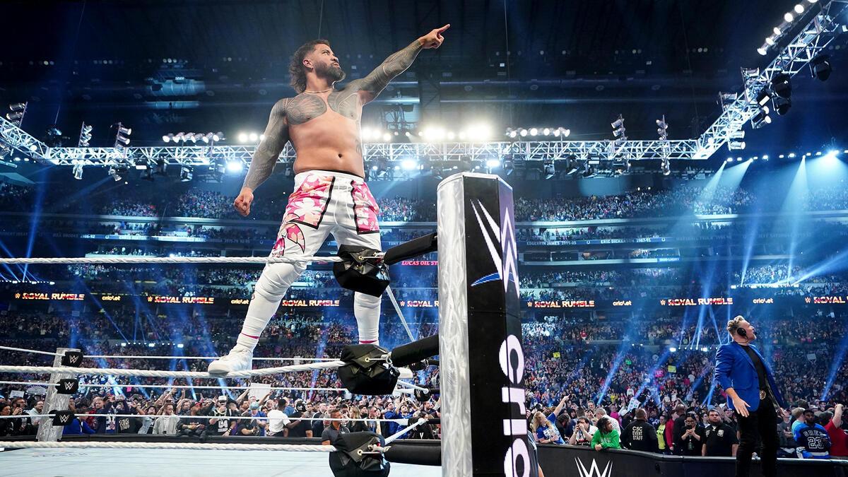 Jey Uso pointing at the WrestleMania 41 sign from the top turnbuckle at WWE Royal Rumble 2025