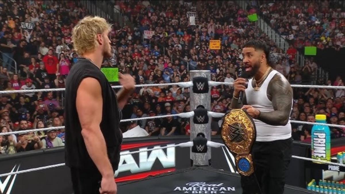 Logan Paul facing off with Jey Uso 