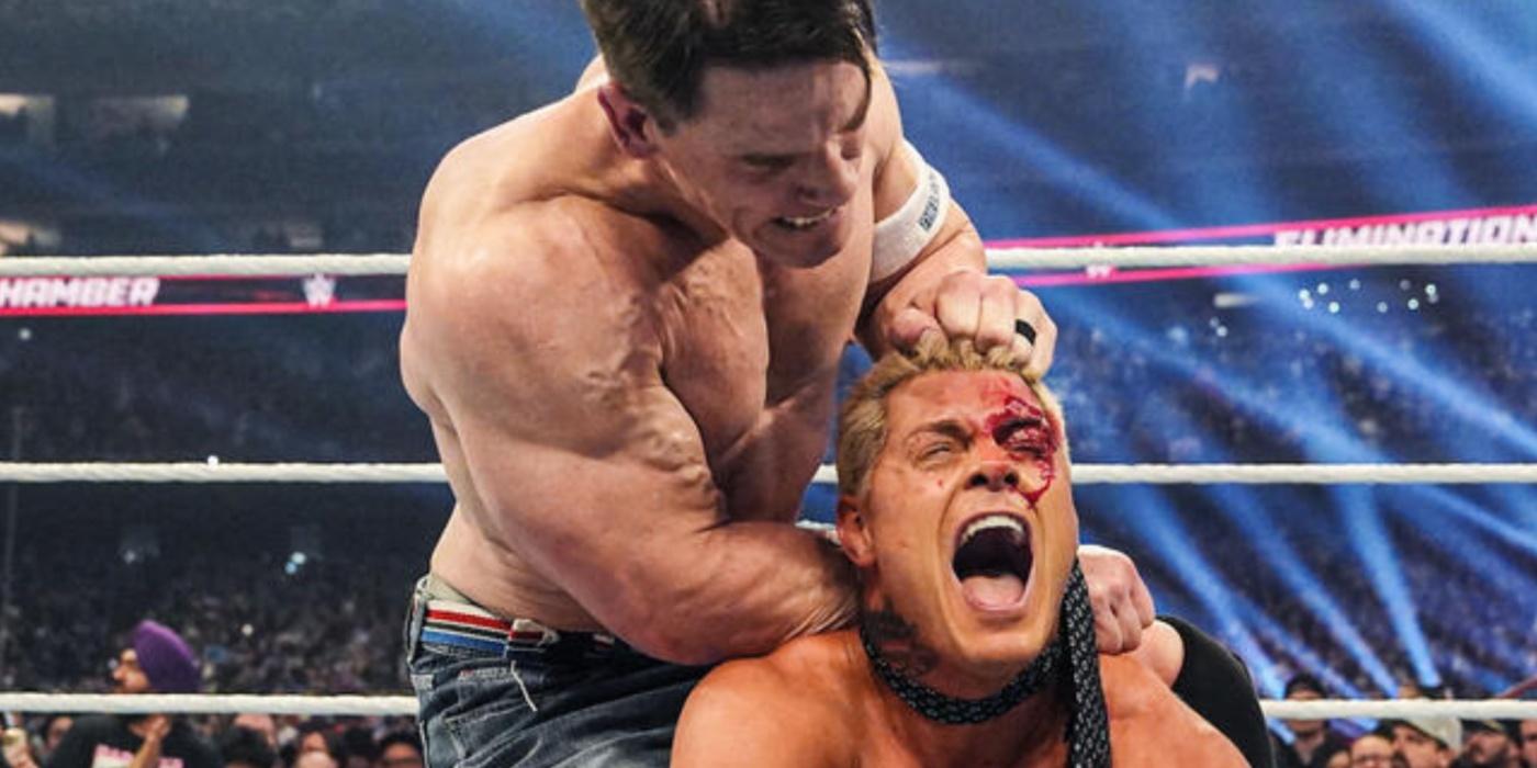 John Cena choking a bloody Cody Rhodes 