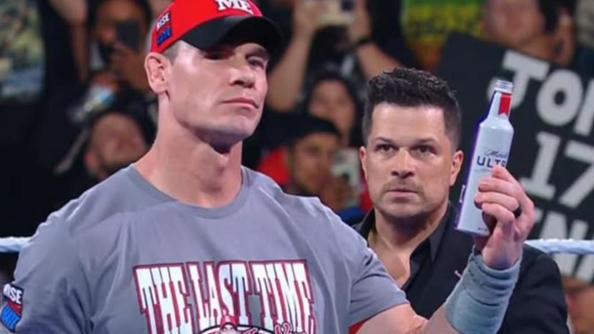John Cena holding a bottle 