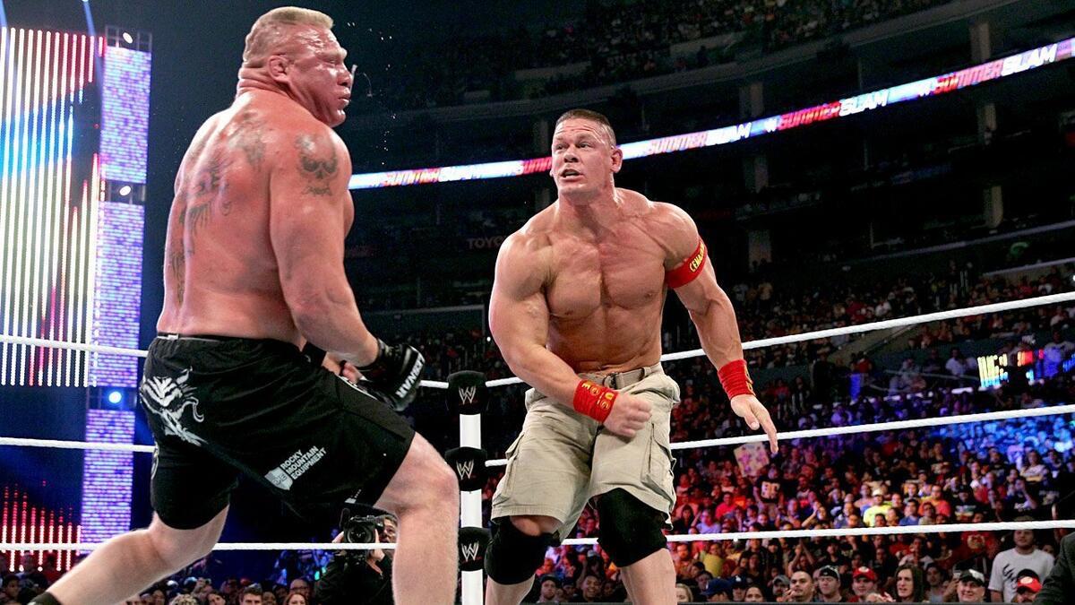 Brock Lesnar looking queasy as John Cena looks on at WWE SummerSlam 2014