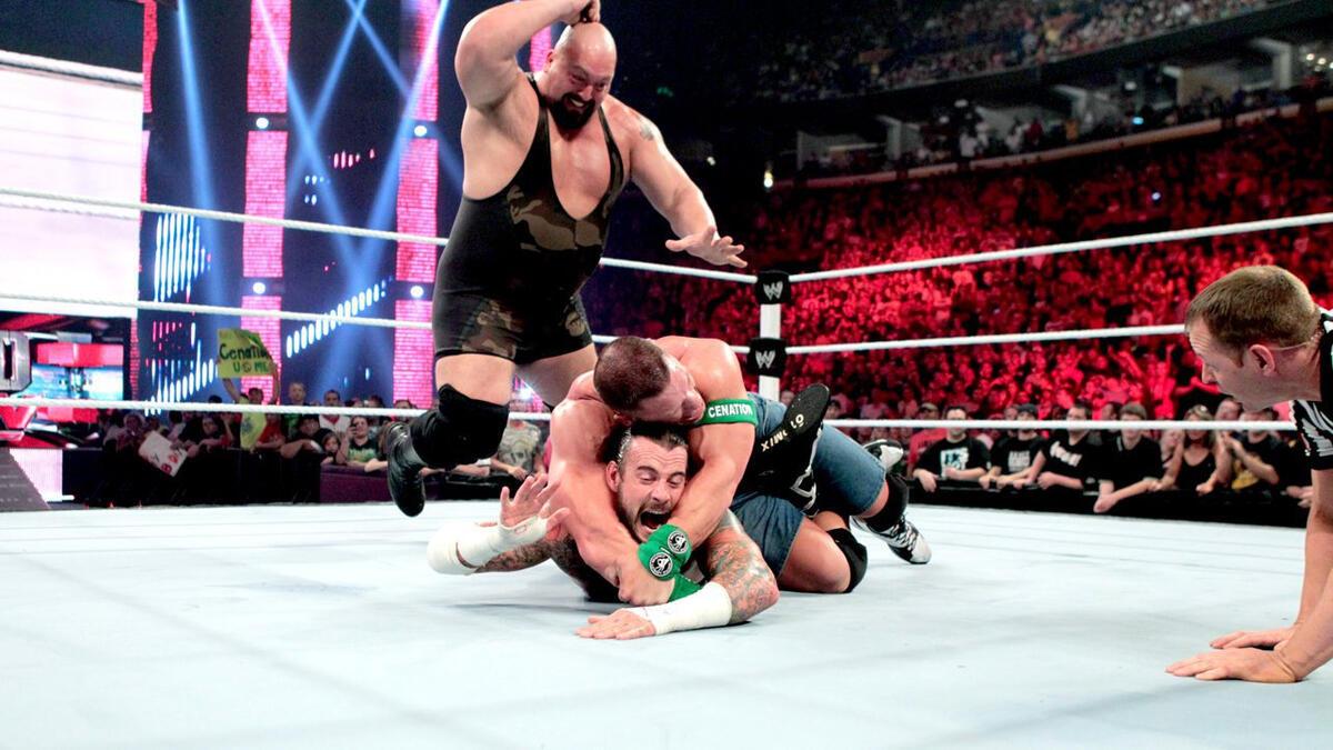 John Cena with an STF on CM Punk as Big Show jumps to attack Cena 
