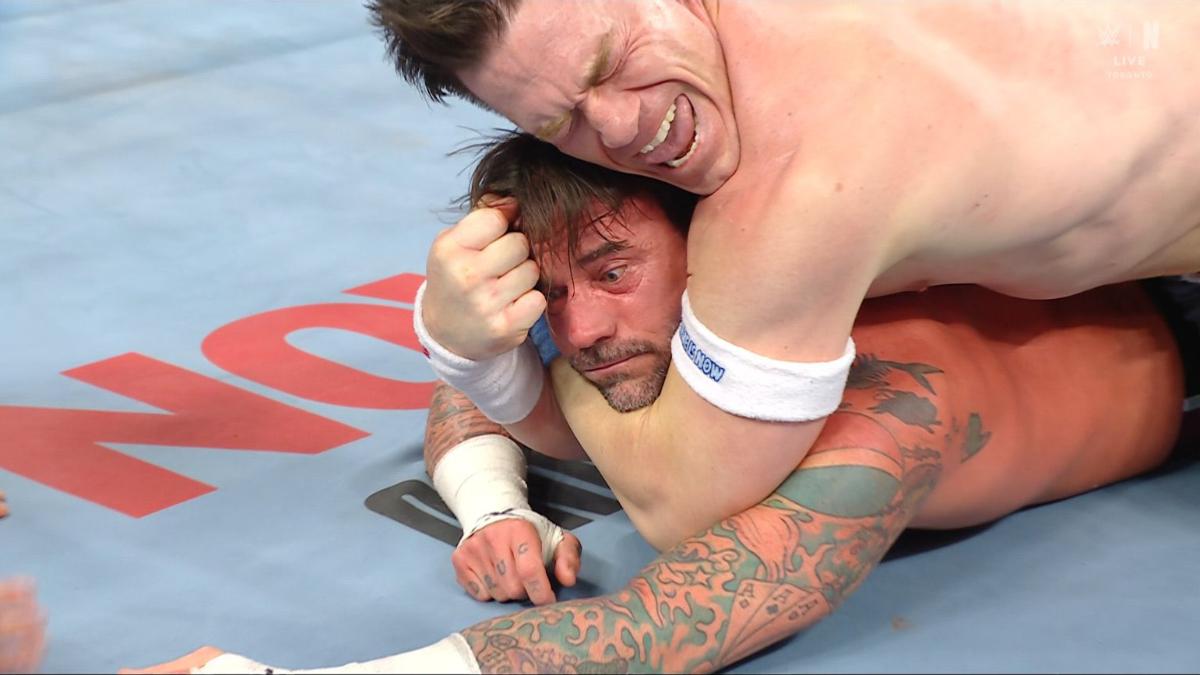 John Cena choking out CM Punk 