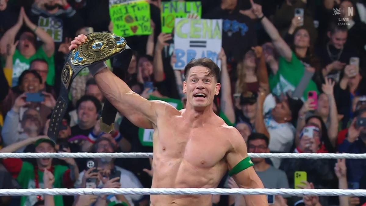 John Cena holding up the WWE Intercontinental Title
