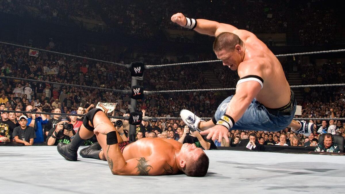 John Cena hitting a five knuckle shuffle to Randy Orton at WWE SummerSlam 2007