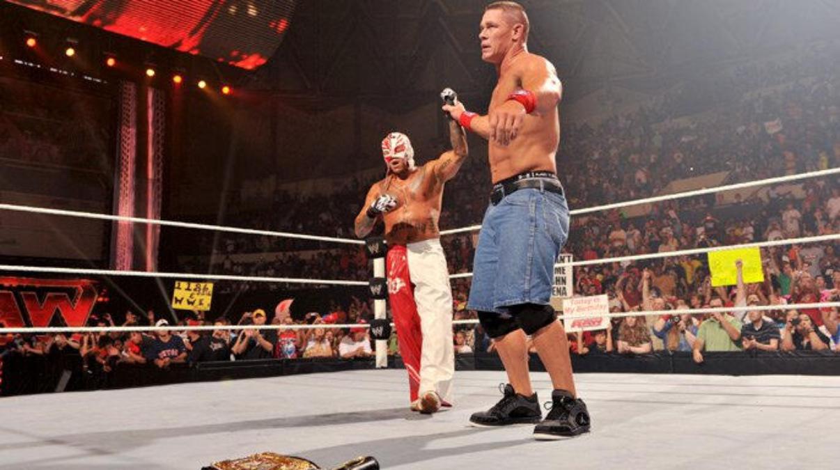 John Cena raising Rey Mysterio's hand despite beating him on 2011 episode of WWE Raw