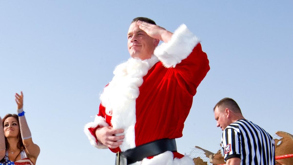 John Cena giving a US army salute in a Santa Claus costume