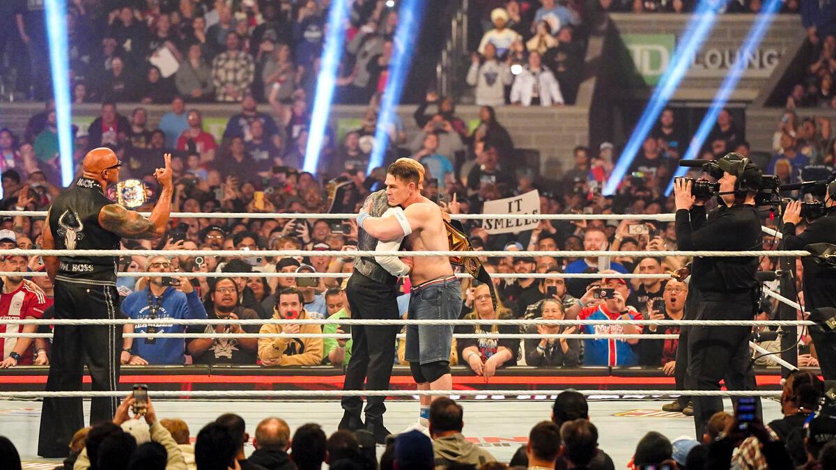 John Cena hugging Cody Rhodes at WWE Elimination Chamber before turning heel