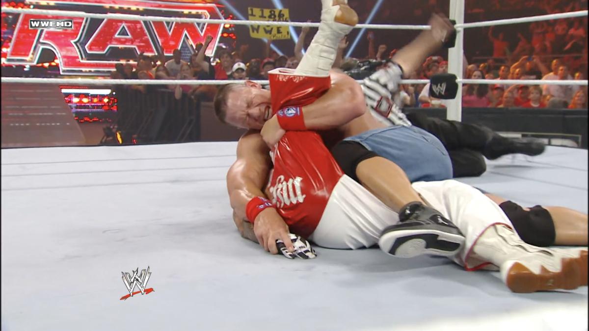 John Cena pinning Rey Mysterio on July 25, 2011 episode of WWE Raw