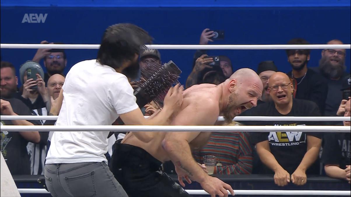 Jon Moxley with spikes in his back on AEW Dynamite