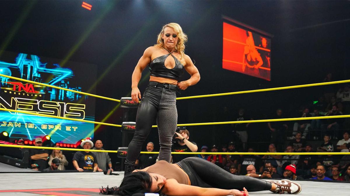 Jordynne Grace in a leather outfit standing over Tessa Blanchard on January 2025 episode of TNA IMPACT