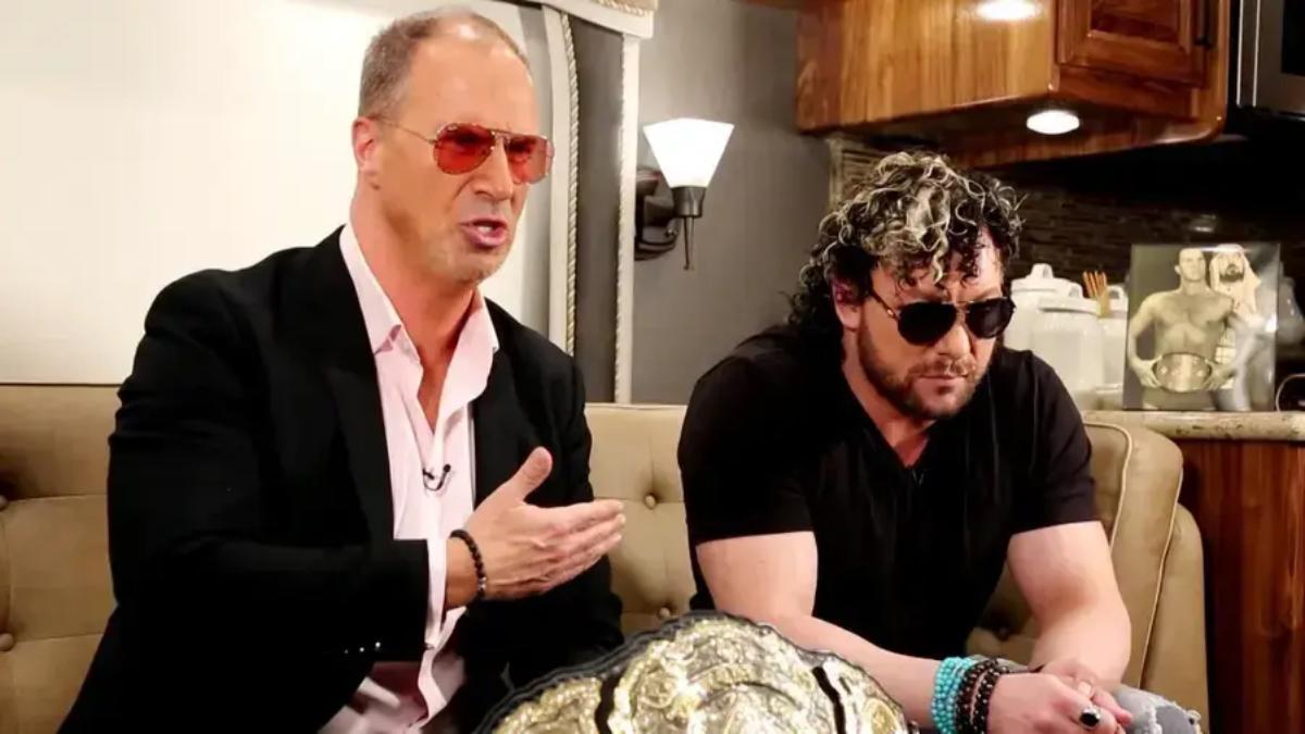 Kenny Omega sitting with Don Callis in a tour bus on a December 2020 episode of IMPACT Wrestling