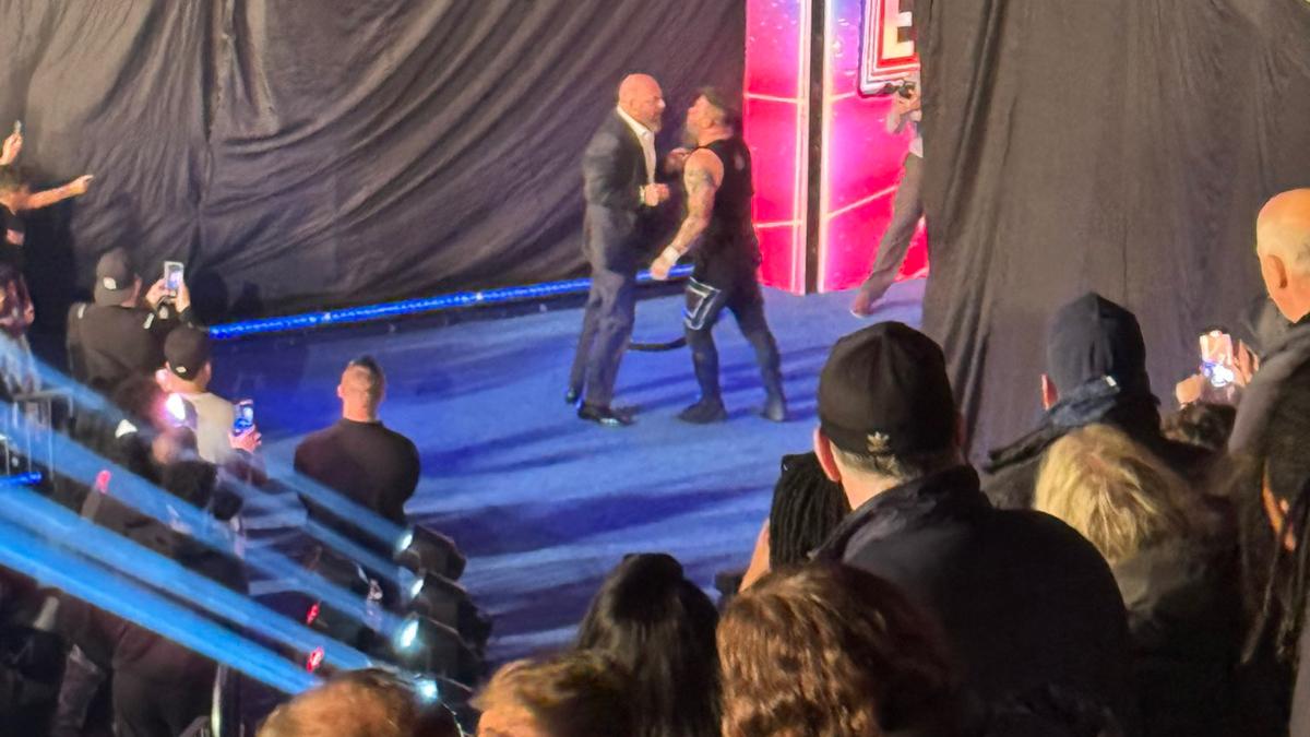 Kevin Owens confronting Triple H following WWE Saturday Night's Main Event