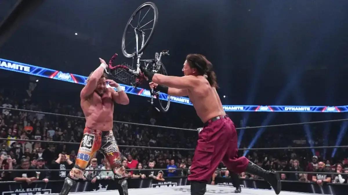 Konosuke Takeshita Kenny Omega bicycle to the head.jpg