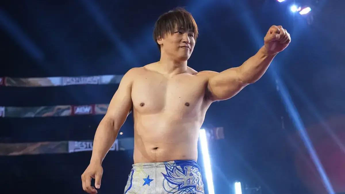 Kota Ibushi smiling and raising his fist to the crowd (not shown)