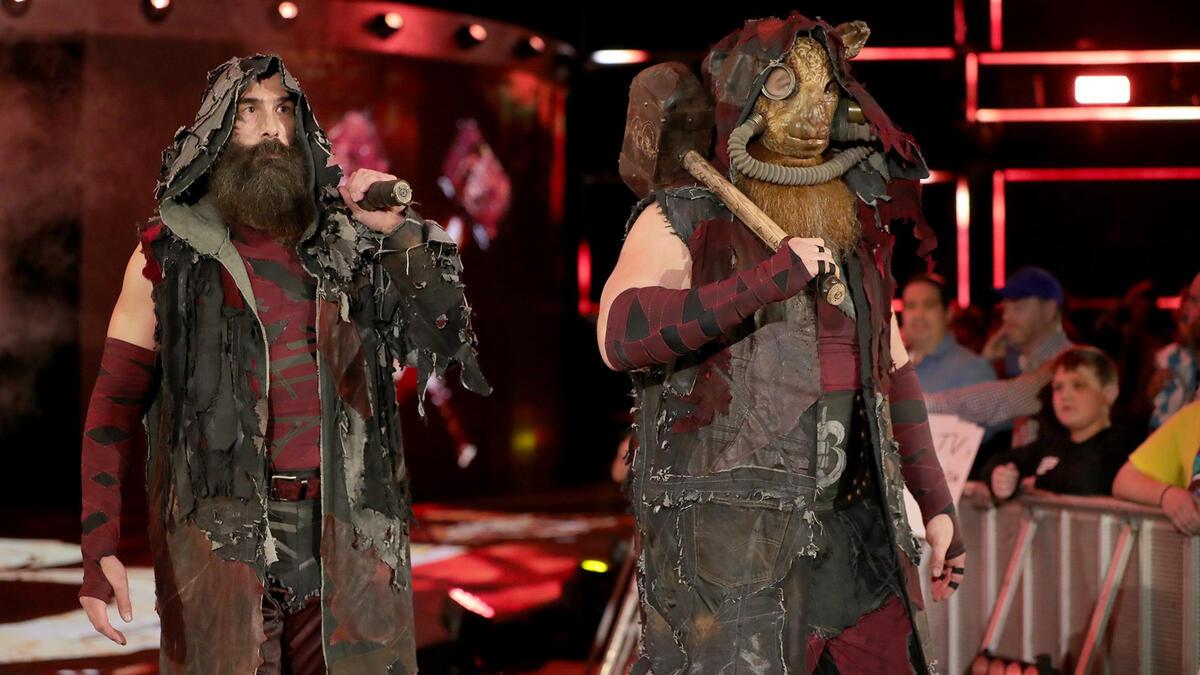 Luke Harper and Erick Rowan making their entrance as the Bludgeon Brothers