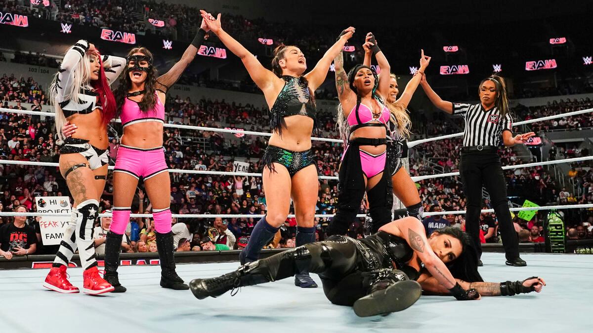 Lyra Valkyria and others celebrating a win on WWE Raw