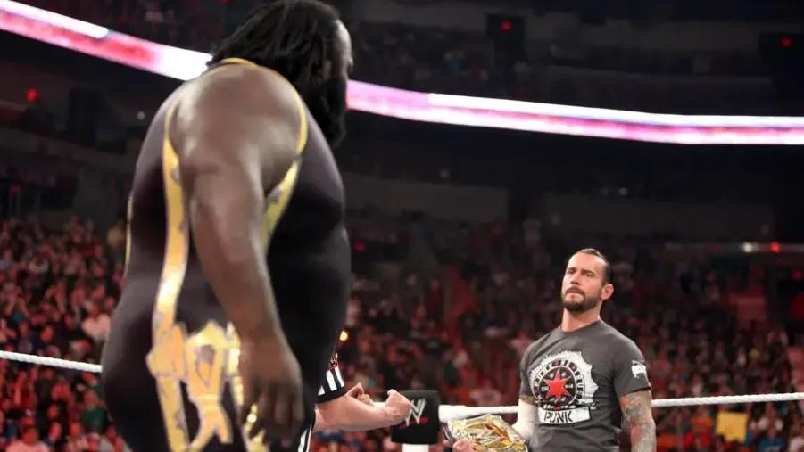 Mark Henry CM Punk WWE Raw 2012.jpg