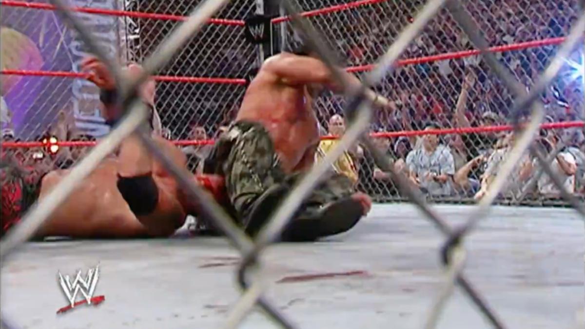 Matt Hardy connecting with a leg drop to Edge at WWE Unforgiven 2005