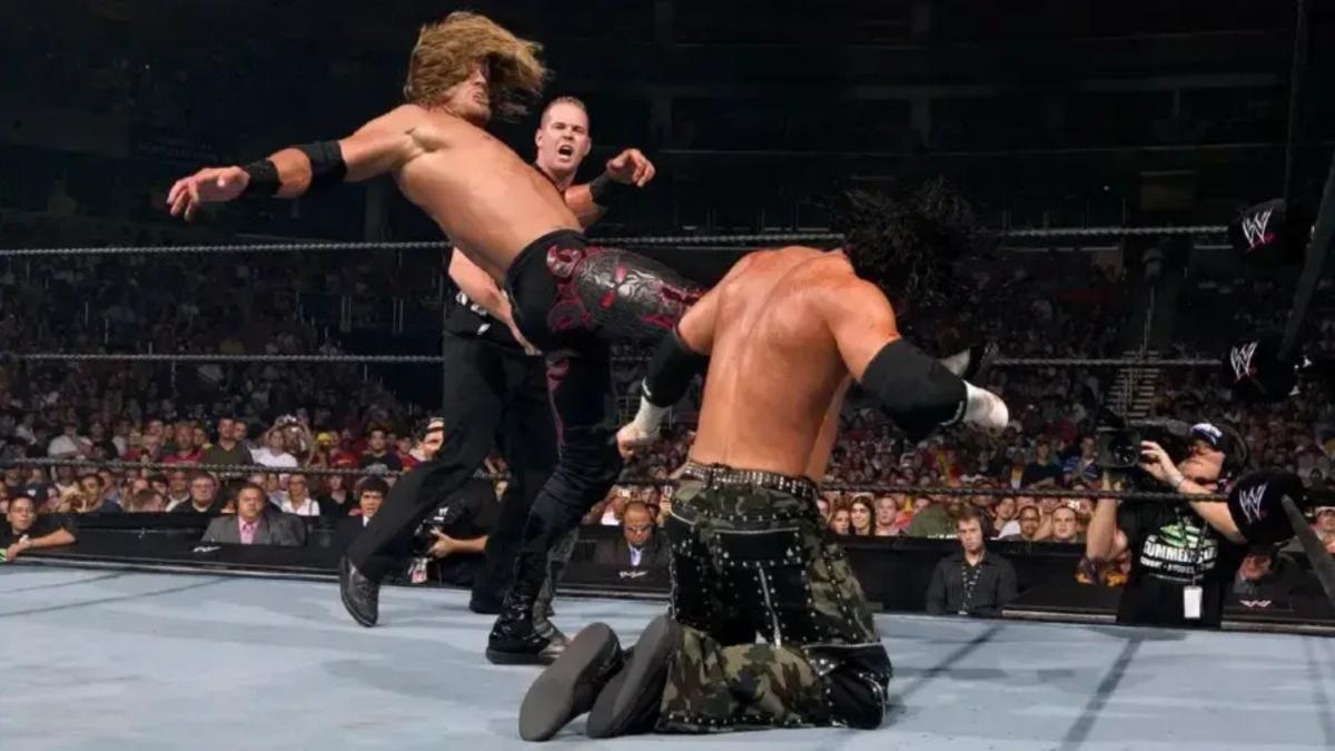 Edge kicking Matt Hardy at SummerSlam 