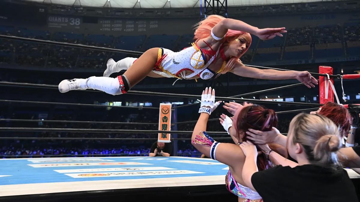 Mercedes Moné hitting a dive at NJPW x AEW Wrestle Dynasty