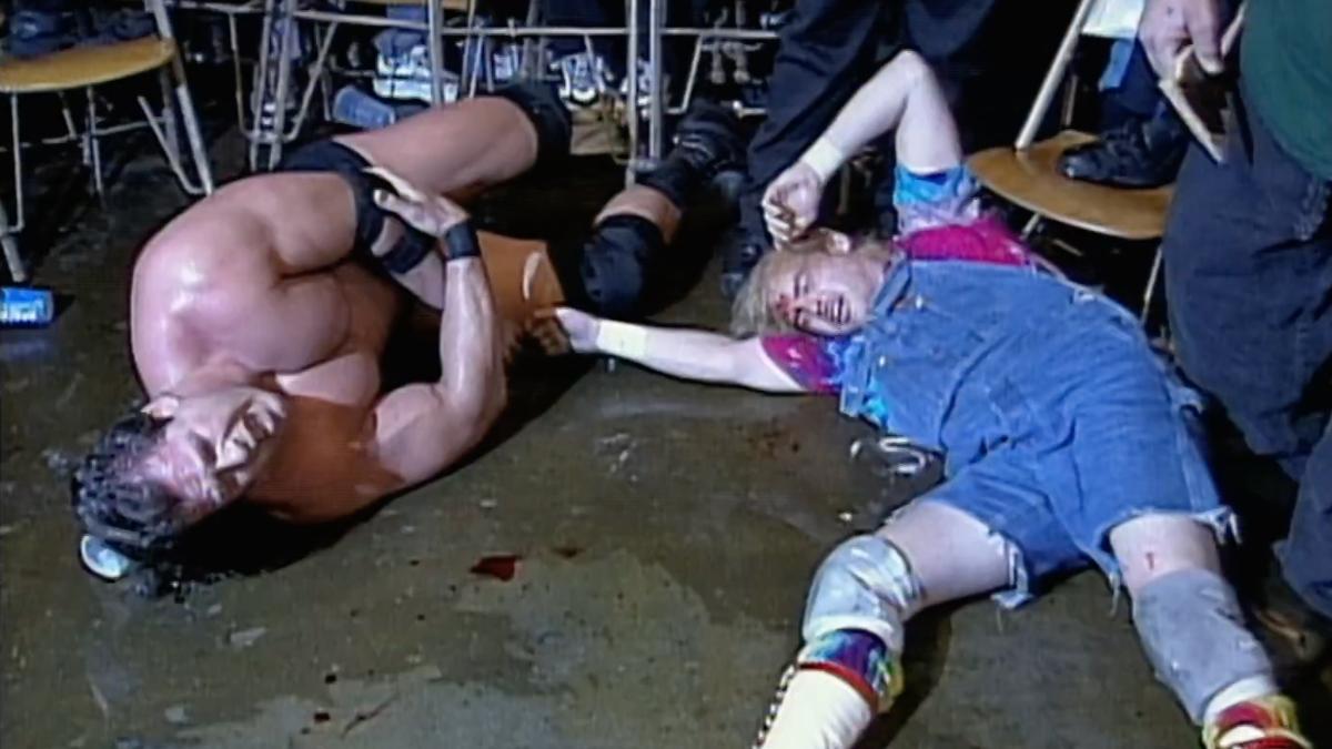 Mike Awesome and Spike Dudley lying on the ground at ECW Guilty as Charged 2000