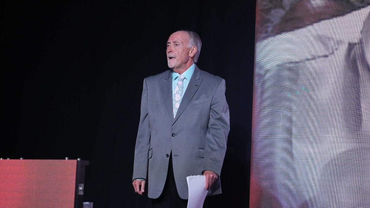 Mike Tenay in grey suit at TNA Bound For Glory 2023