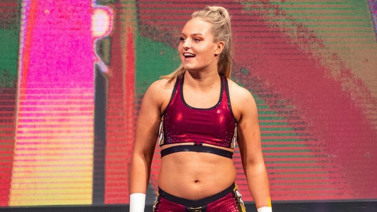 Millie McKenzie in red attire