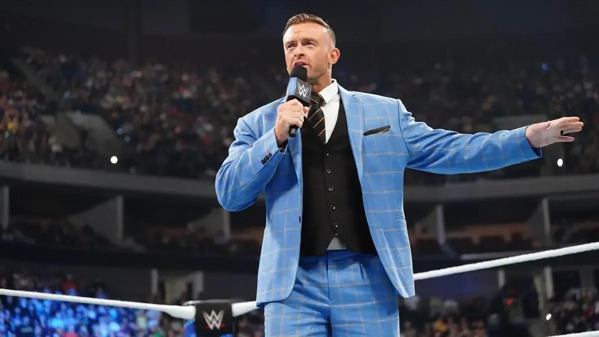 Nick Aldis big blue suit.jpeg