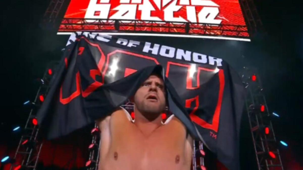 Nigel McGuinness draped in a ROH flag 