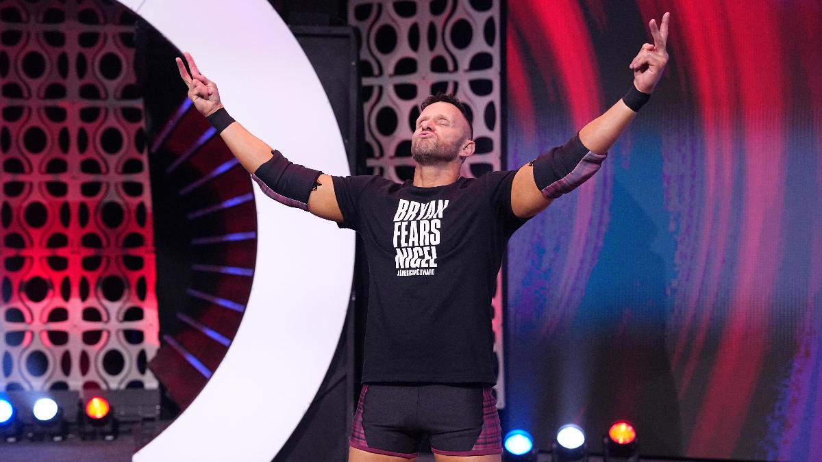 Nigel McGuinness swearing at the crowd on stage during AEW Dynamite Grand Slam entrance