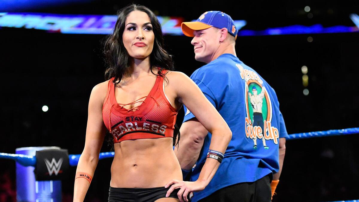 Nikki Bella and John Cena stand together in the ring during a 2017 edition of SmackDown